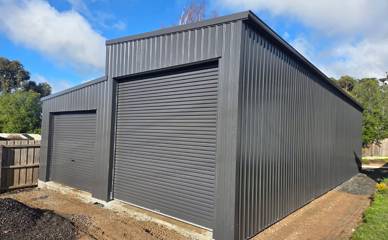 35. Double Garages - 16L x 4W x 3.9H + 4m Wide Enclosed Awning
